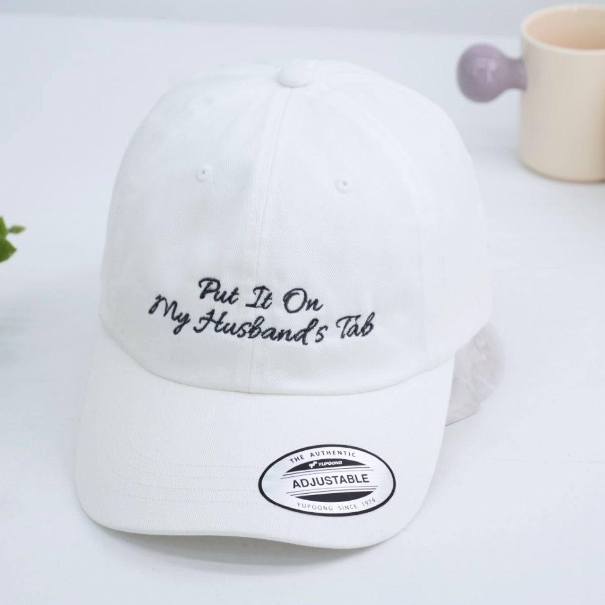 Put It On My Husband's Tab Embroidered Cap - Funny Wife Married Couple Accessory - Honeymoon Gift