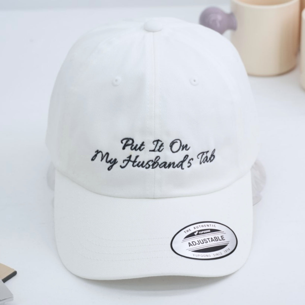 Put It On My Husband's Tab Embroidered Cap - Funny Wife Married Couple Accessory - Honeymoon Gift